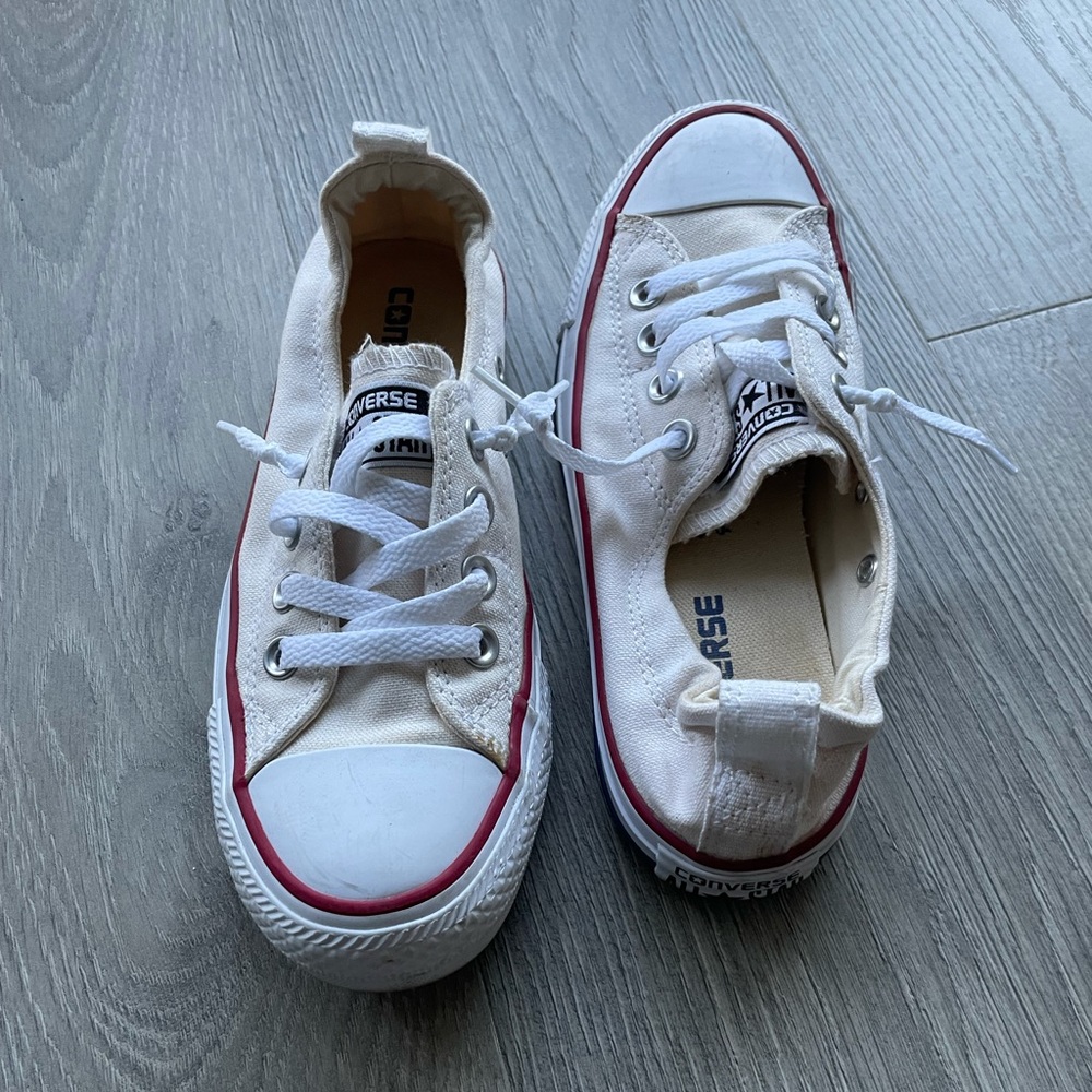 Cream colored converse all stars